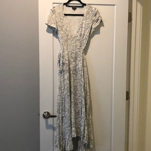 Black abs white wrap dress